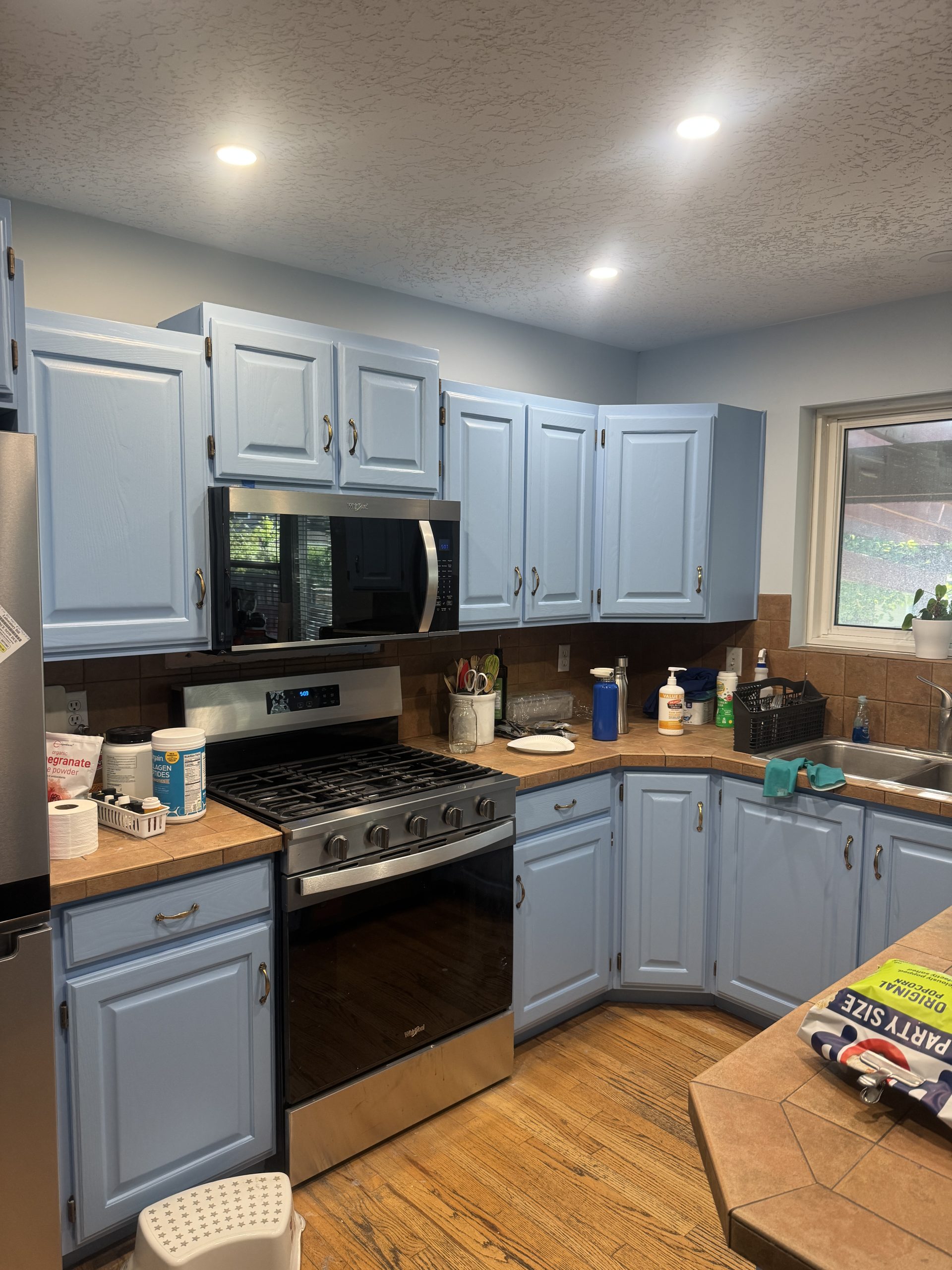Blue painted kitchen cabinets